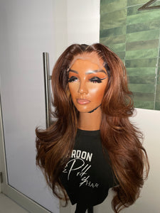 26” Honey w/ peek a boo blonde highlights and layers